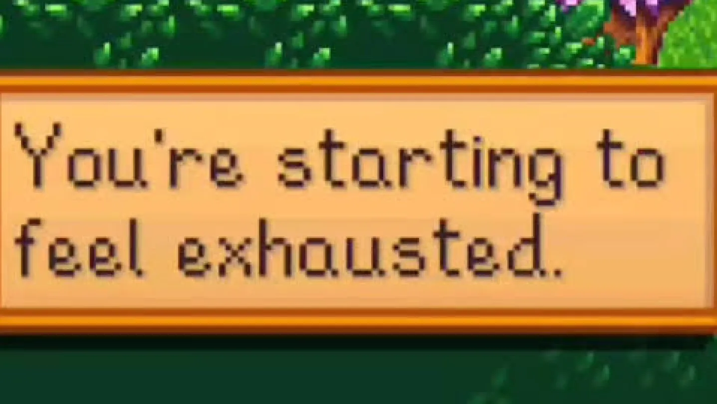 A Stardew Valley dialogue box reading: You're starting to feel exhausted.